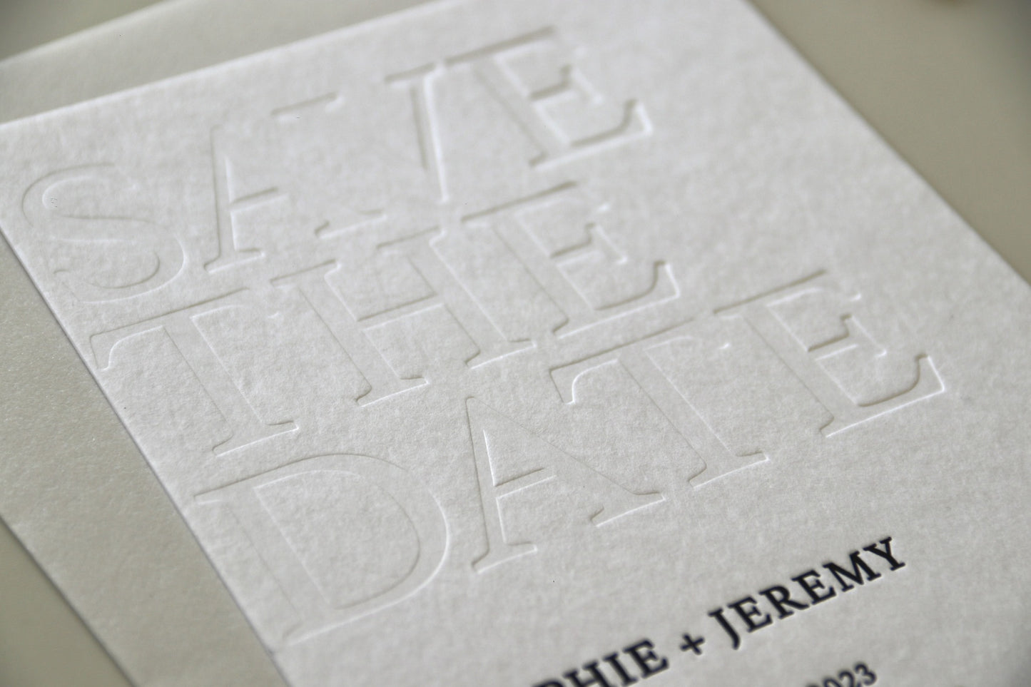 Debossed letterpress invitation
