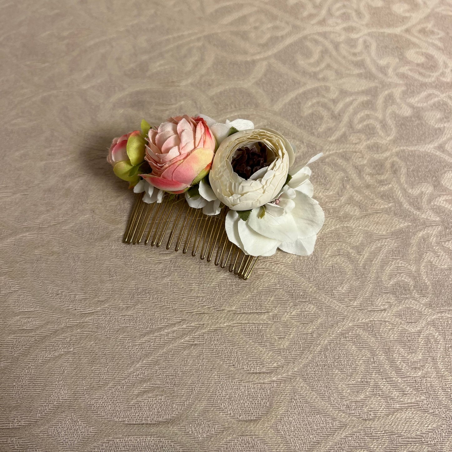 White and pink floral comb